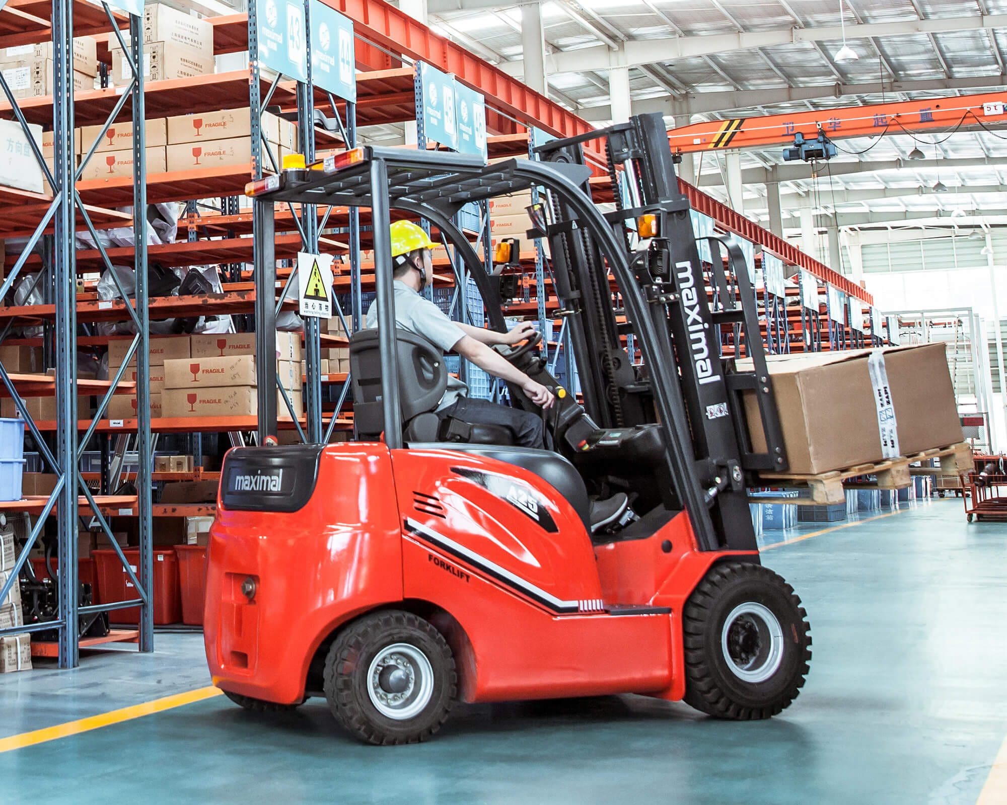 A worker operating a red forklift in a warehouse filled with shelves of boxes.